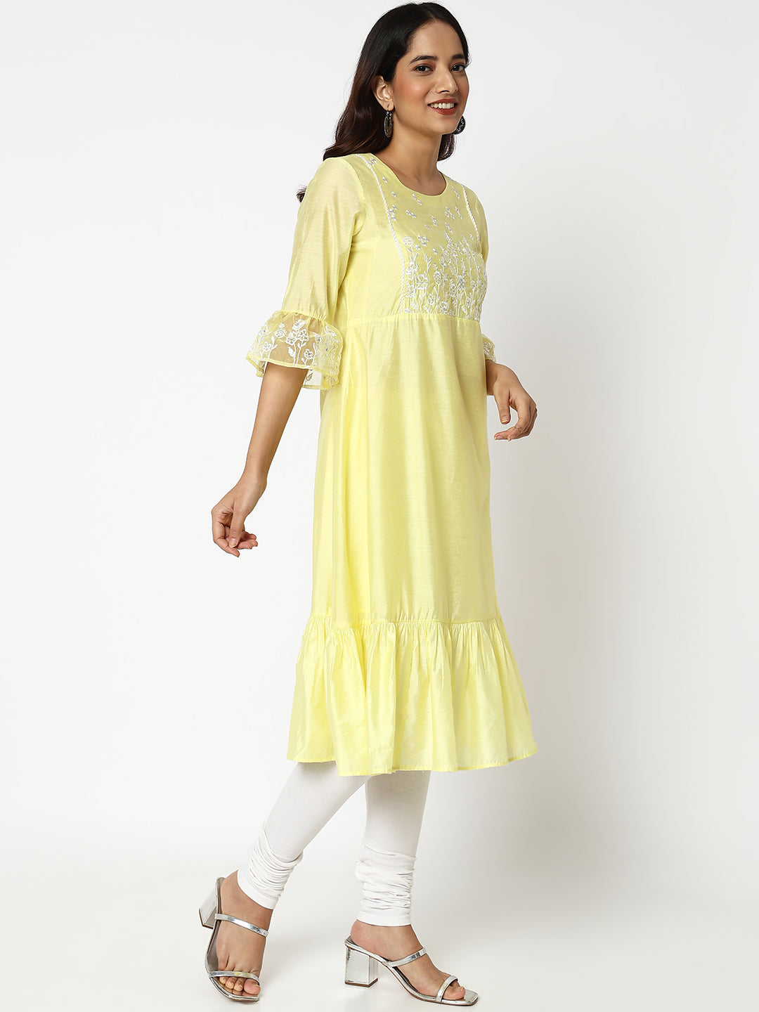 Women Wearing Flared Fit Embroidered Kurta