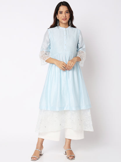 Nylangan Women Wearing Baby Blue Viscose Silk Embroidered Kurta