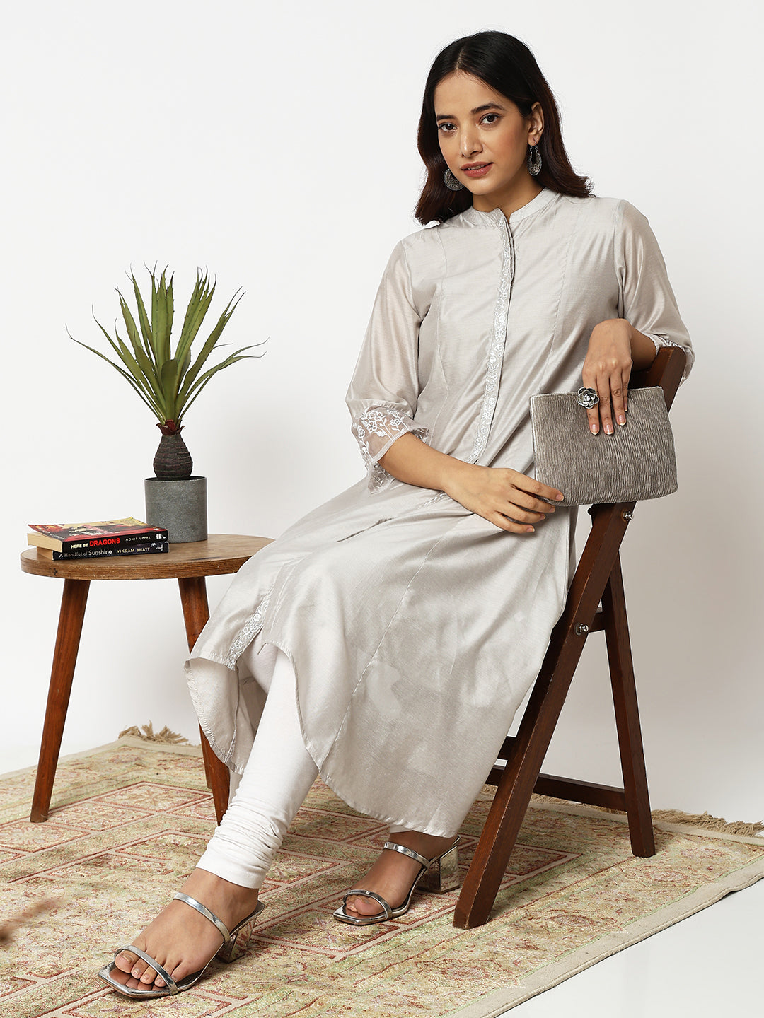 Women Wearing Straight Fit Embroidered Kurta