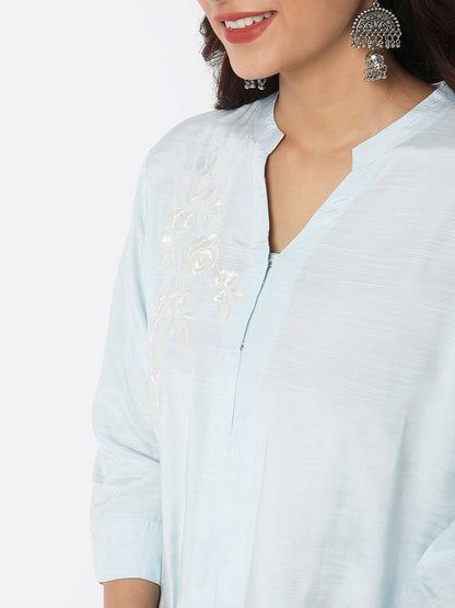 Nylangan Women Wearing Blue Viscose Embroidered Kurta