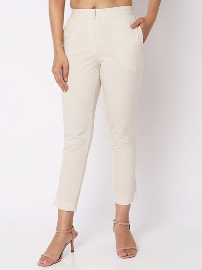 Women Wearing Golden Cream Cotton Solid Pant