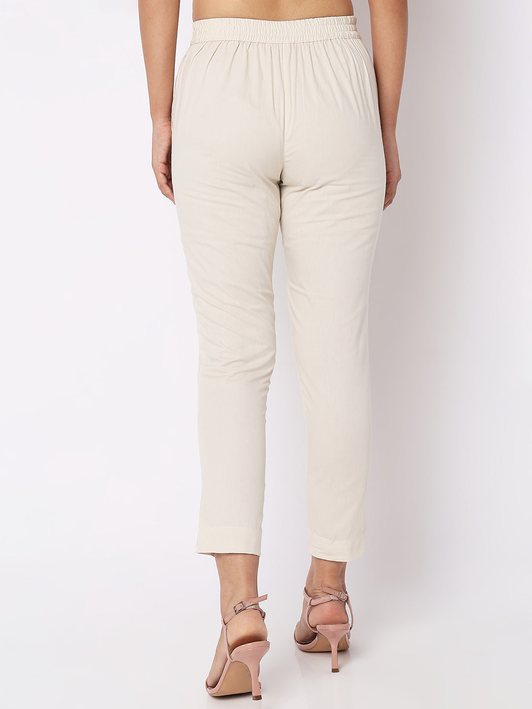 Women Wearing Golden Cream Cotton Solid Pant
