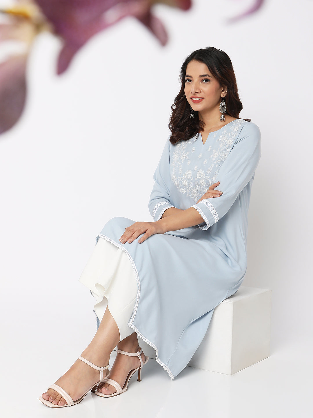 Women Wearing Ice Blue Viscose Embroidered Kurta
