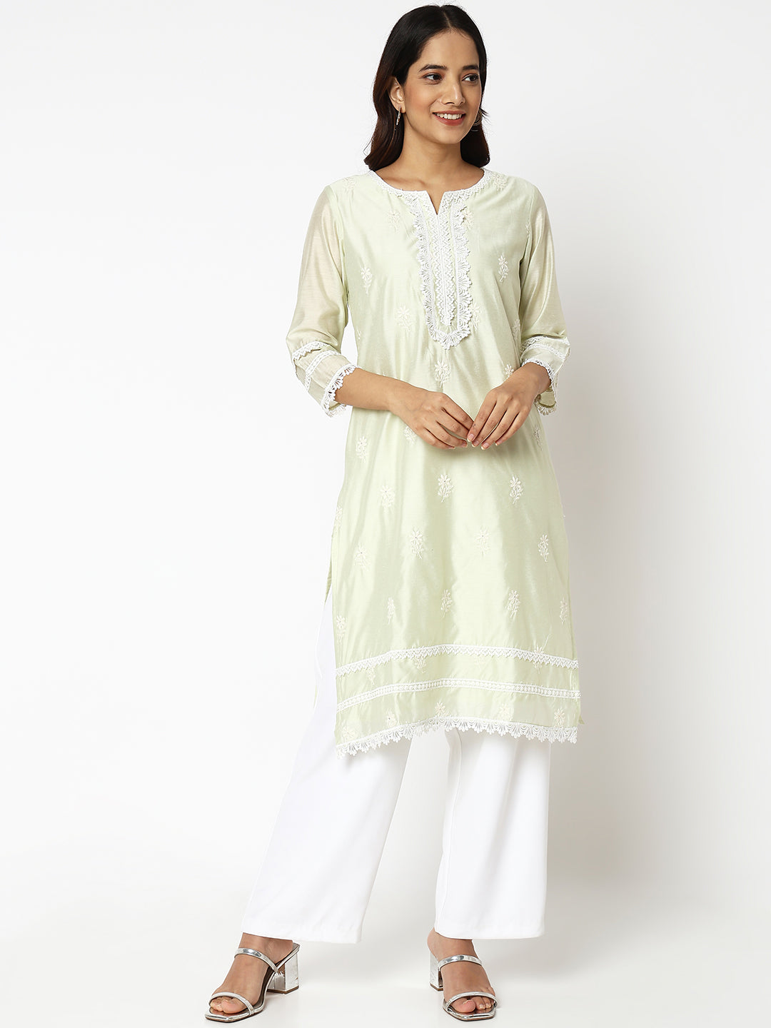 Women Wearing Straight Fit Embroidered Kurta