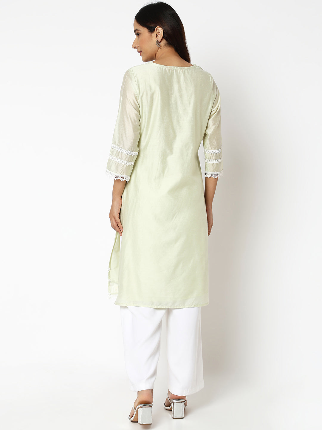 Women Wearing Straight Fit Embroidered Kurta
