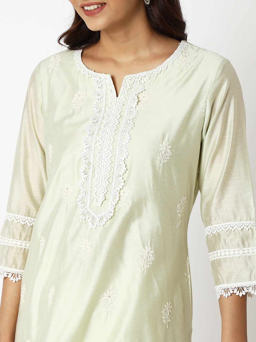 Women Wearing Straight Fit Embroidered Kurta