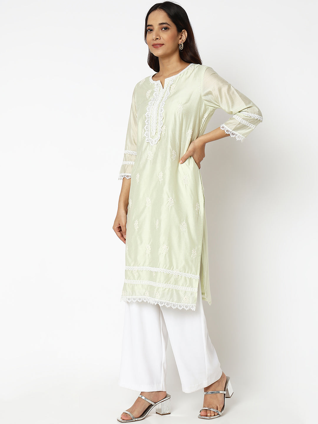 Women Wearing Straight Fit Embroidered Kurta