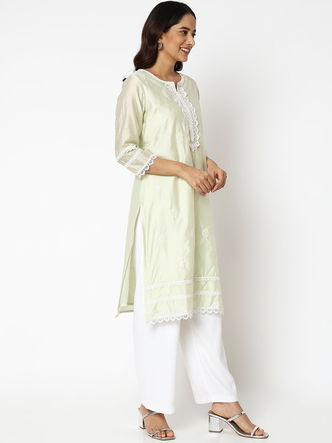 Women Wearing Straight Fit Embroidered Kurta